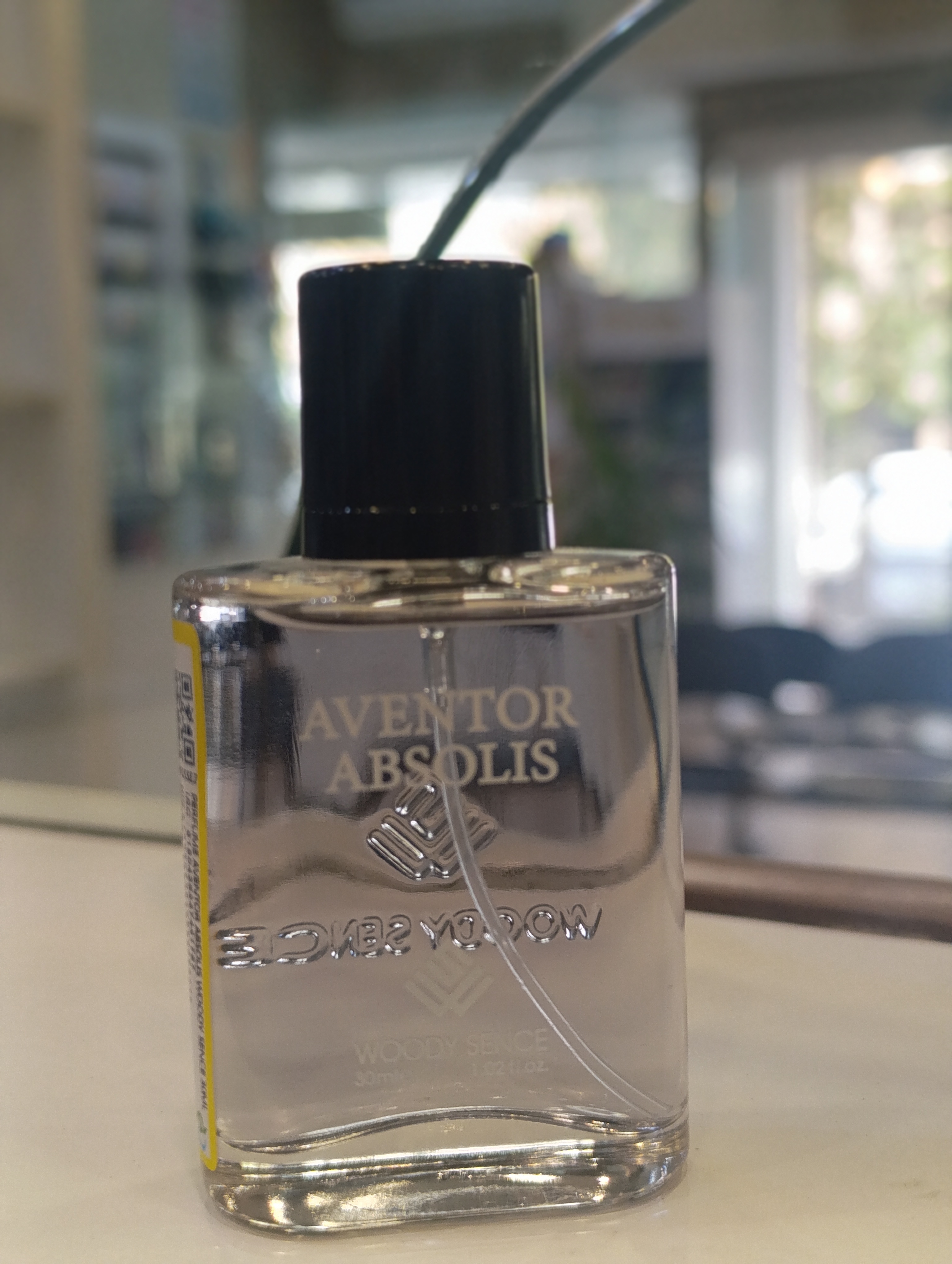 عطر جیبی مردانه وودی سنس مدل اونتور ابیولیس